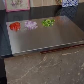 EdgeCut Pro Stainless Steel Chopping Board
(35x31cm)
